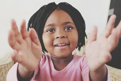 Close-up portrait of smiling girl