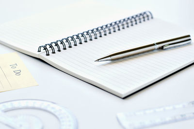 High angle view of paper currency on white background