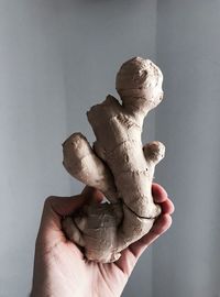 Close-up of man holding hand