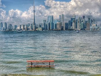View of modern buildings in city against sky