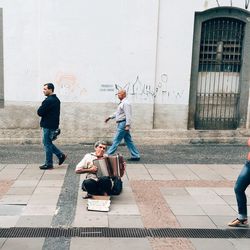 Full length of woman standing in city