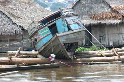 Fishing boats moored in lake