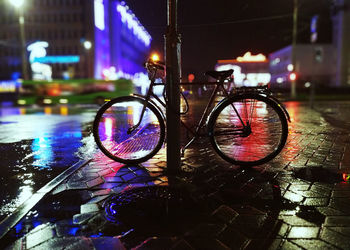 Bicycles on wet street during rainy season