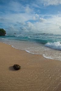 Scenic view of beach against sky