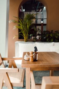 Simplistic interior of cafe with wooden tables