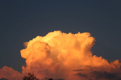 Low angle view of dramatic sky during sunset