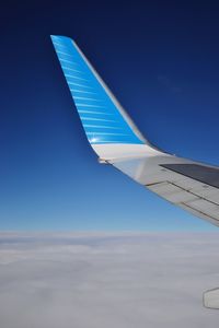 Low angle view of airplane flying in sky