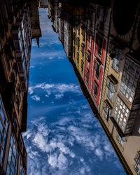 Low angle view of city against sky