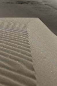 Close-up of sand at beach