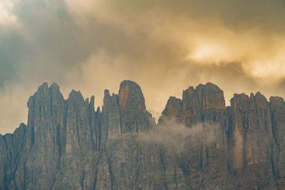 Panoramic view of rock formations against sky