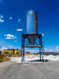 Low angle view of water tower against sky