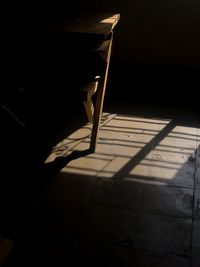 High angle view of sunlight falling on floor