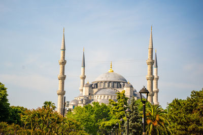 Low angle view of mosque against clear sky