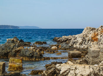 Scenic view of sea against clear sky