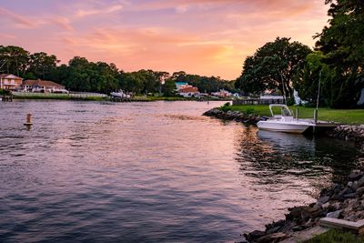 Boats moored at harbor