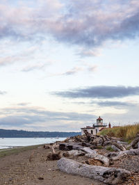 Scenic view of sea against cloudy sky