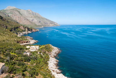 Scenic view of sea against blue sky