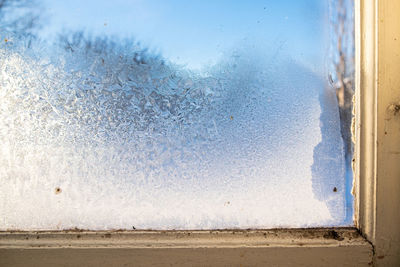 Close-up of frozen glass window