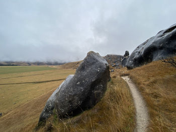 Scenic view of land against sky