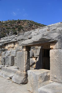 Low angle view of old ruins against clear sky