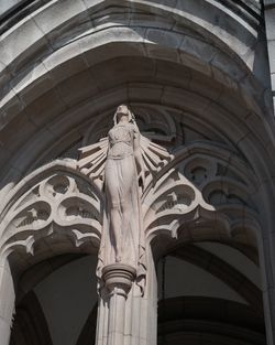 Low angle view of statue of historic building