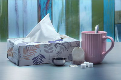 Close-up of coffee cup on table