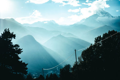 Scenic view of mountains against sky during winter