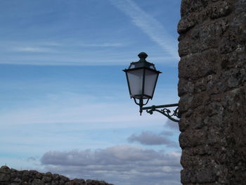 Street light against sky