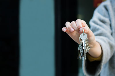 Cropped hand holding keys