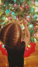 Full length of woman dancing at night