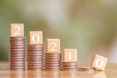 Close-up of coins on table