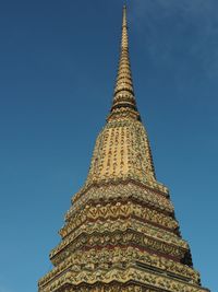 Low angle view of temple against building