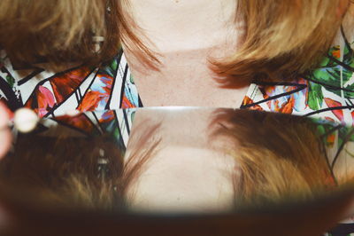 High angle view of girl sitting at home