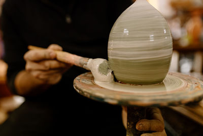 Artisan working with clay