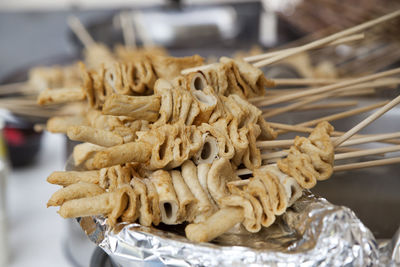 High angle view of fresh oden in skewers at store