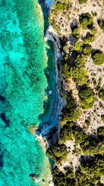 High angle view of rocks in sea