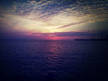 Scenic view of sea at sunset