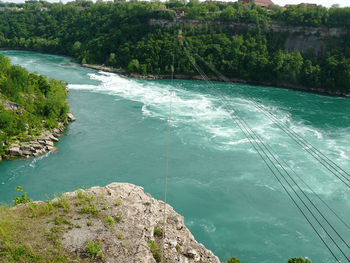 High angle view of sea against mountain