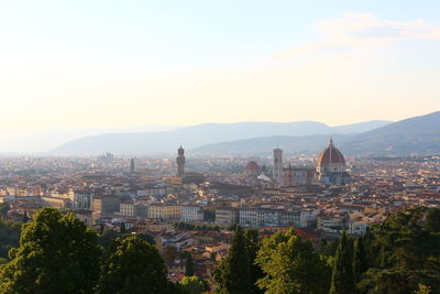 High angle view of townscape against sky in city