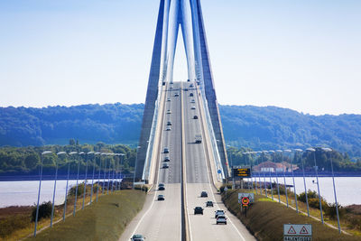 View of bridge over river against clear sky
