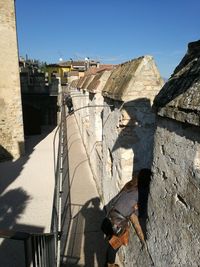 Shadow of historic building on sunny day