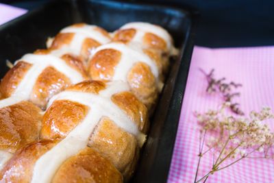 Close-up of hot cross bun in container during easter