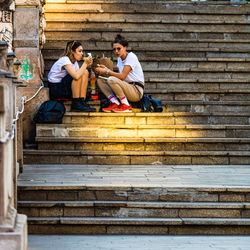 People sitting on staircase