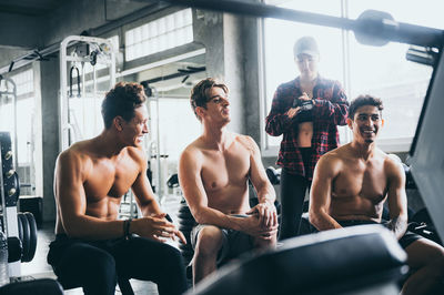 Group of people sitting in room