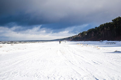 Scenic view of beach against sky