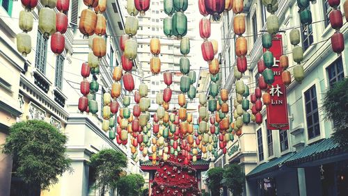 Low angle view of lanterns hanging in row