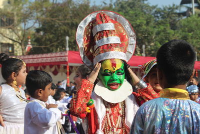 People standing in traditional clothing