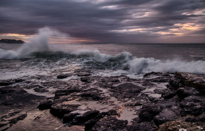 Scenic view of sea against sky during sunset