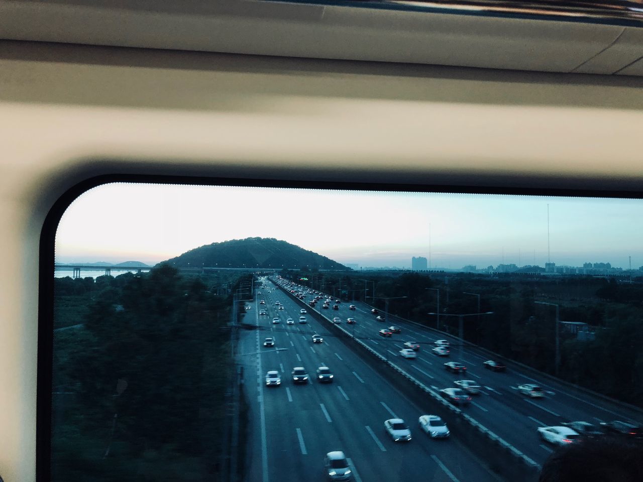 HIGHWAY SEEN THROUGH WINDSHIELD