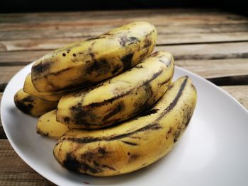 High angle view of bananas in plate on table